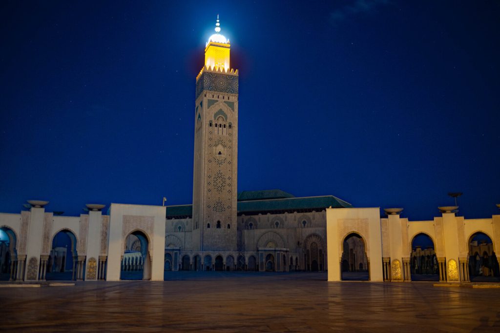 10 day Morocco itinerary from Casablanca - travelers exploring the Hassan II Mosque and coastal landmarks at the start of their Moroccan journey